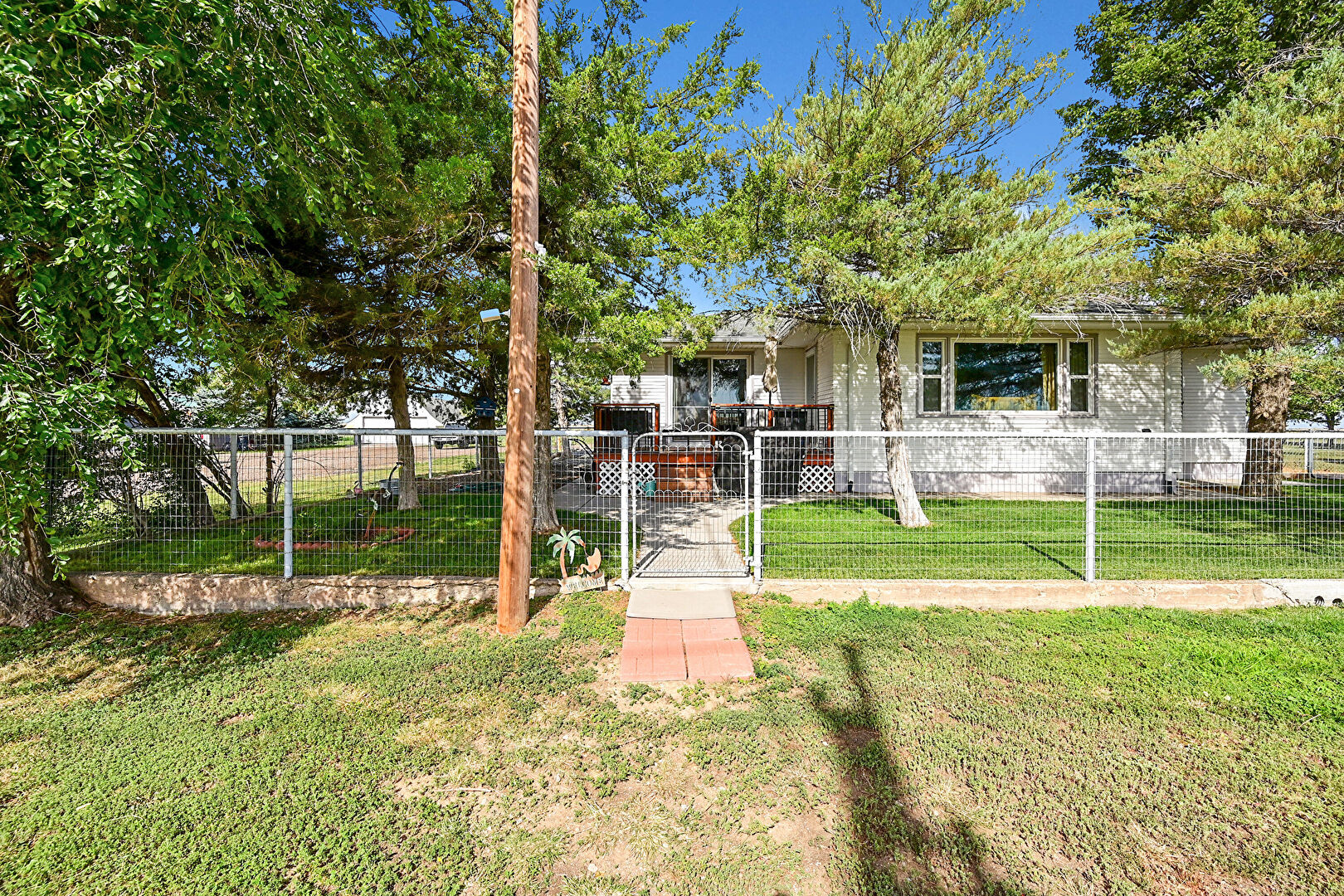 Front at 8555 North Converse Road, Bennett, CO 80102, listed by Eric Hart