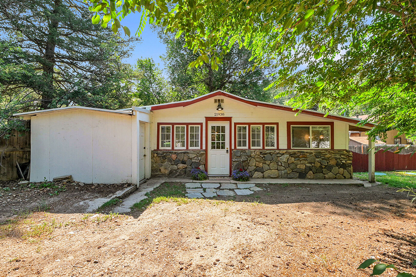 Front at 21938 Miller Lane, Idledale, CO 80453, listed by Tammy Drozda, MLS ID: 9272531