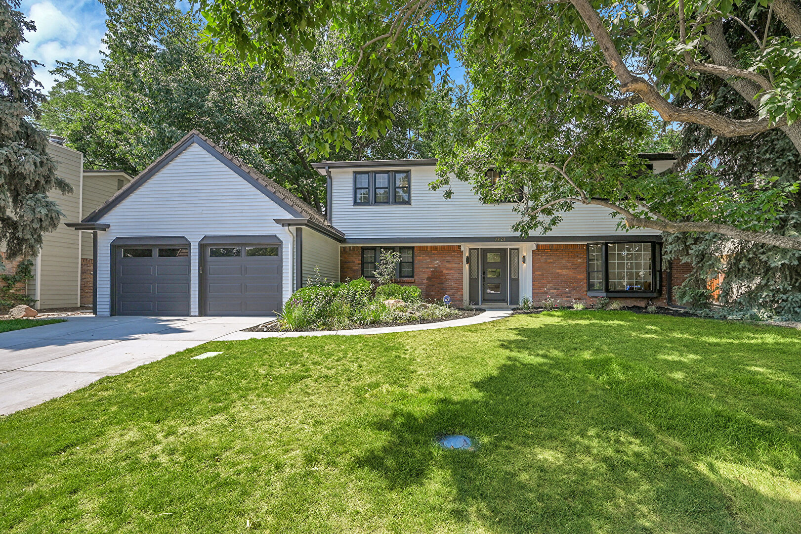 Front at 3821 South Magnolia Way, Denver, CO 80237, listed by Eric Ybarra