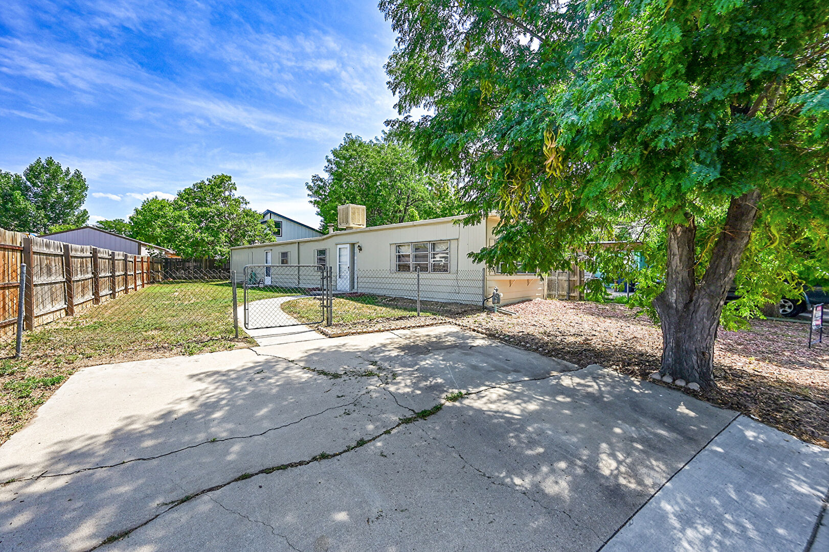 Front at 900 Glen Dale Street, Dacono, CO 80514, listed by Jennifer Bozarth