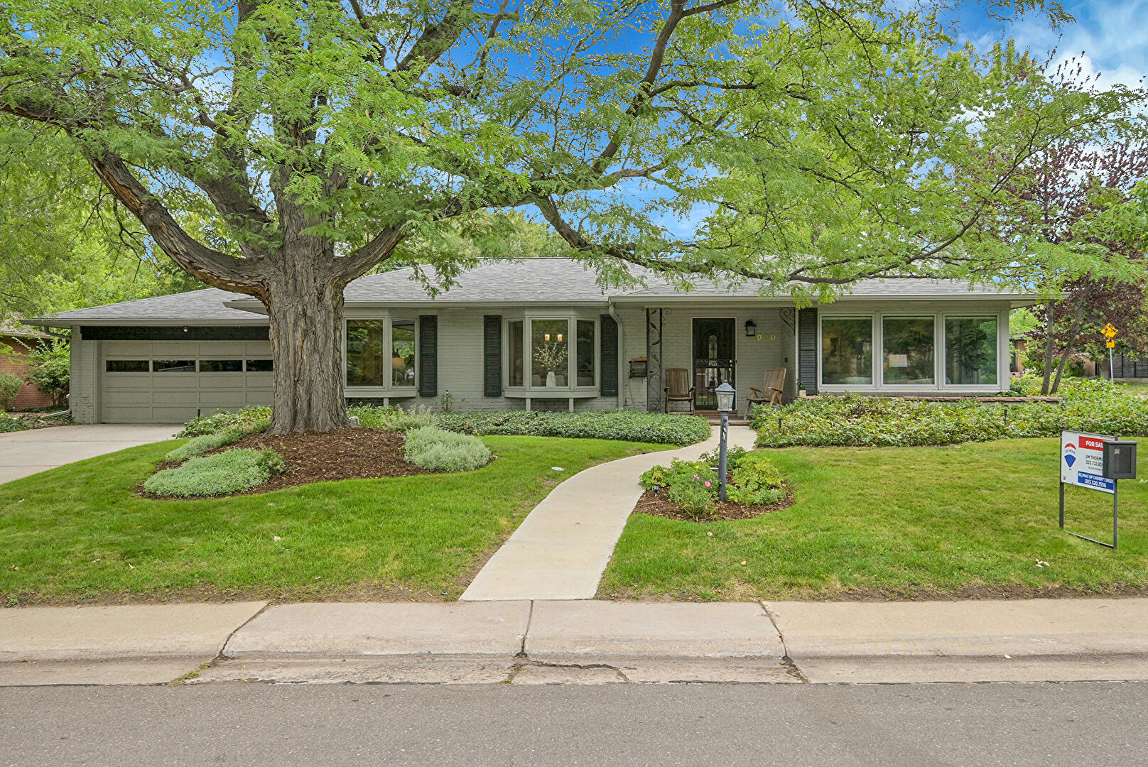 Front at 990 South Jackson Street, Denver, CO 80209, listed by Brenda Moore