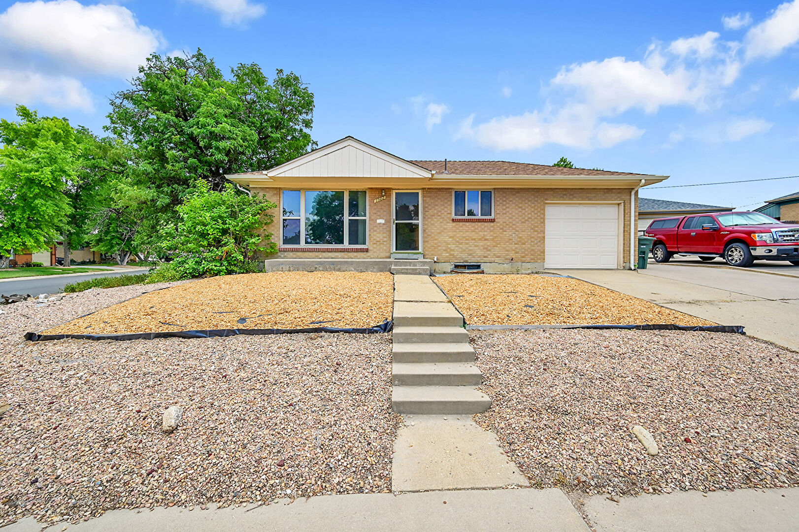 Front at 1502 East 110th Place, Northglenn, CO 80233, listed by Amy Metz