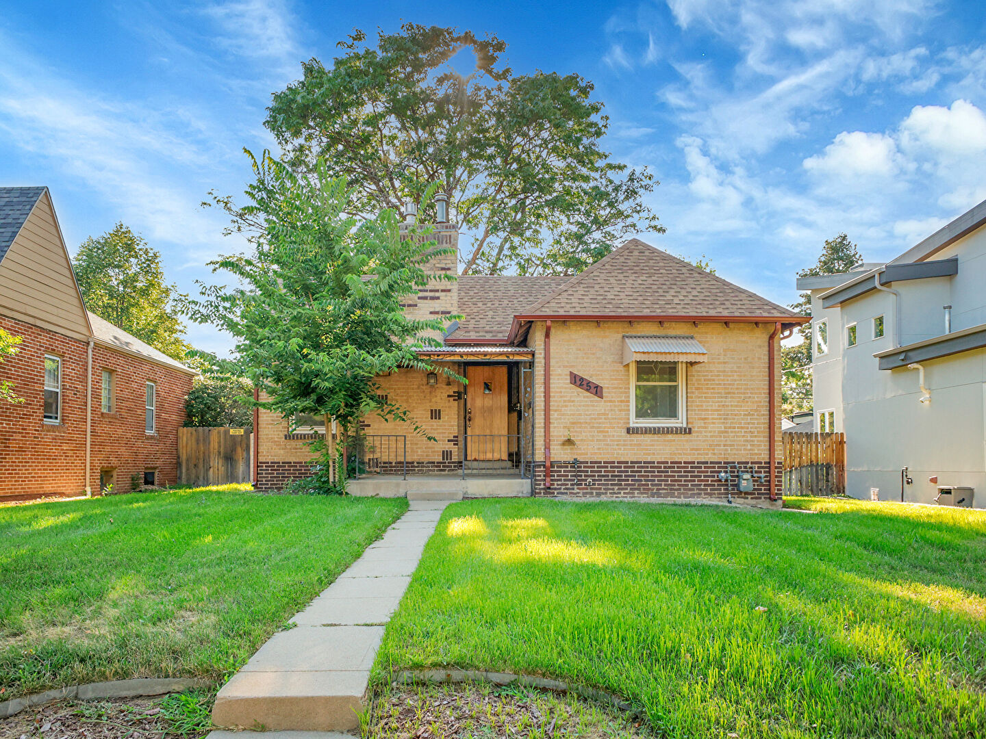 Front at 1257 Niagara Street, Denver, CO 80220, listed by Taylor Haas