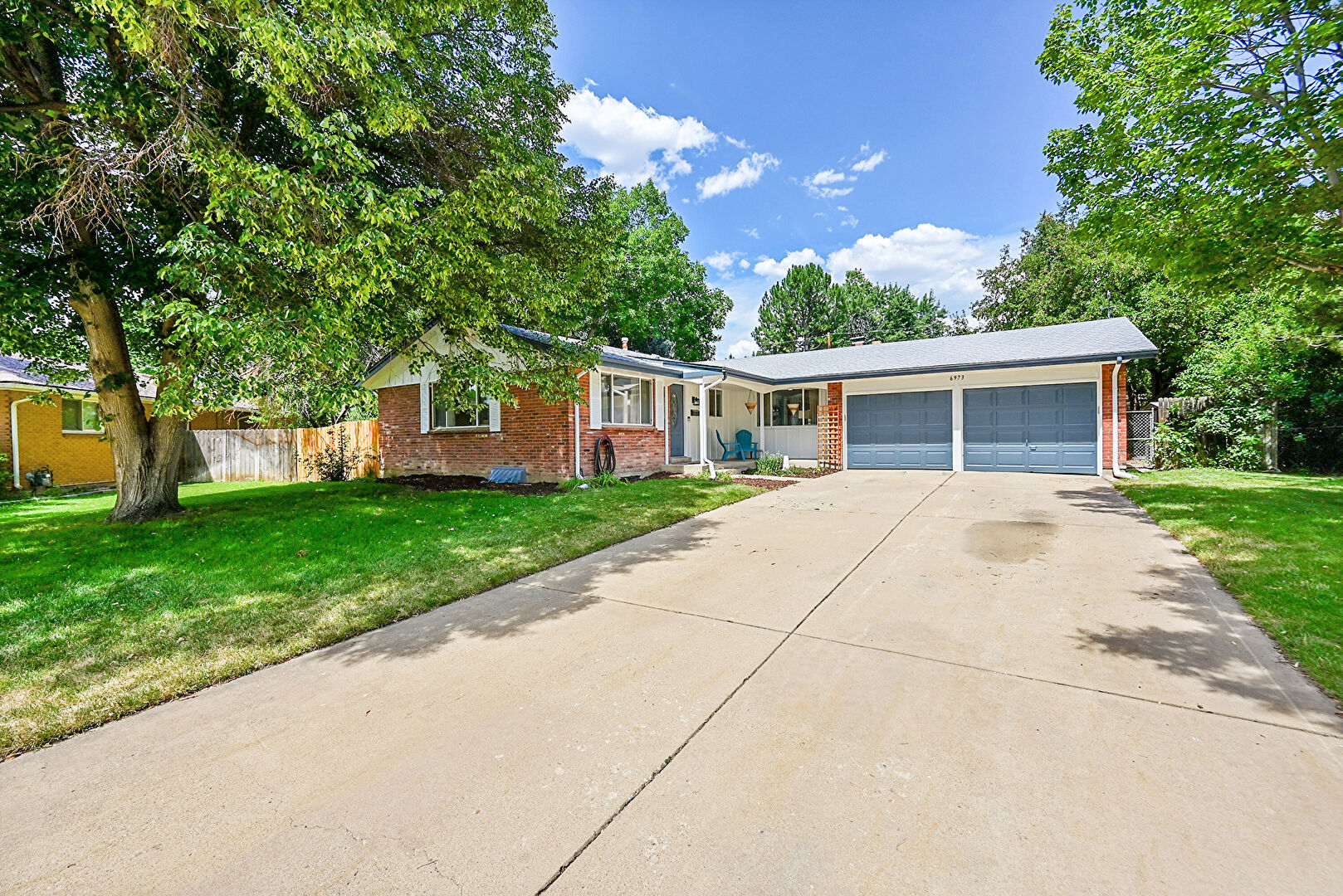 Front at 6973 Oak Way, Arvada, CO 80004, listed by Eric Carlton, MLS ID: 9462180