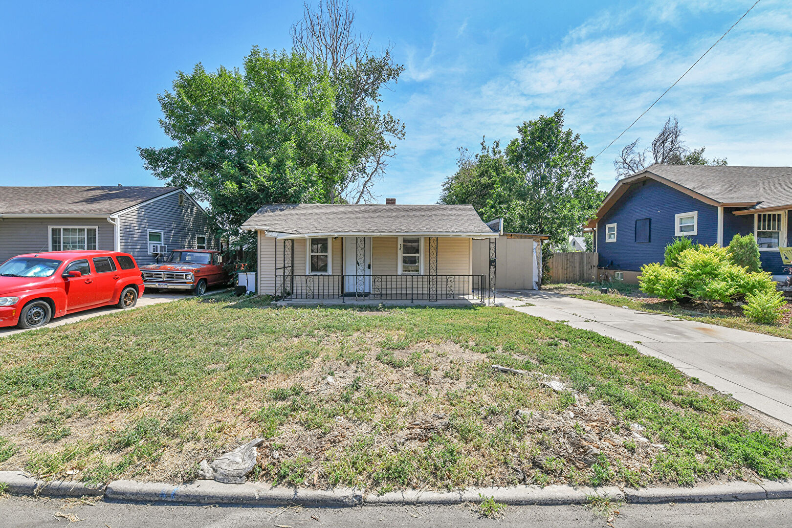 Front at 450 Raleigh Street, Denver, CO 80219, listed by Chris Greenburg