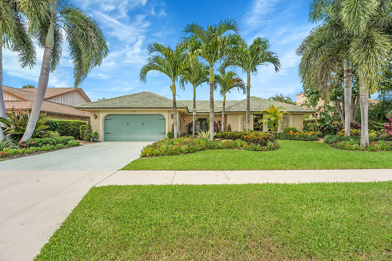 Front at 2647 Monaco Terrace, Palm Beach Gardens, FL 33410, listed by Chris Dyer