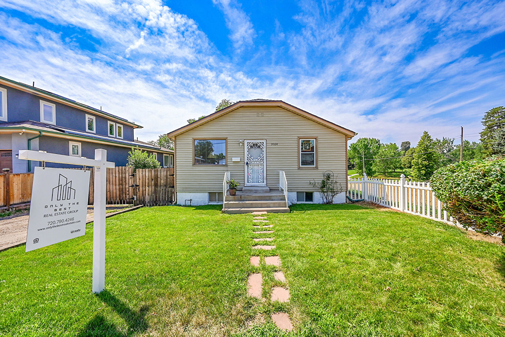 Front at 3164 West Iowa Avenue, Denver, CO 80219, listed by Cesar Pena