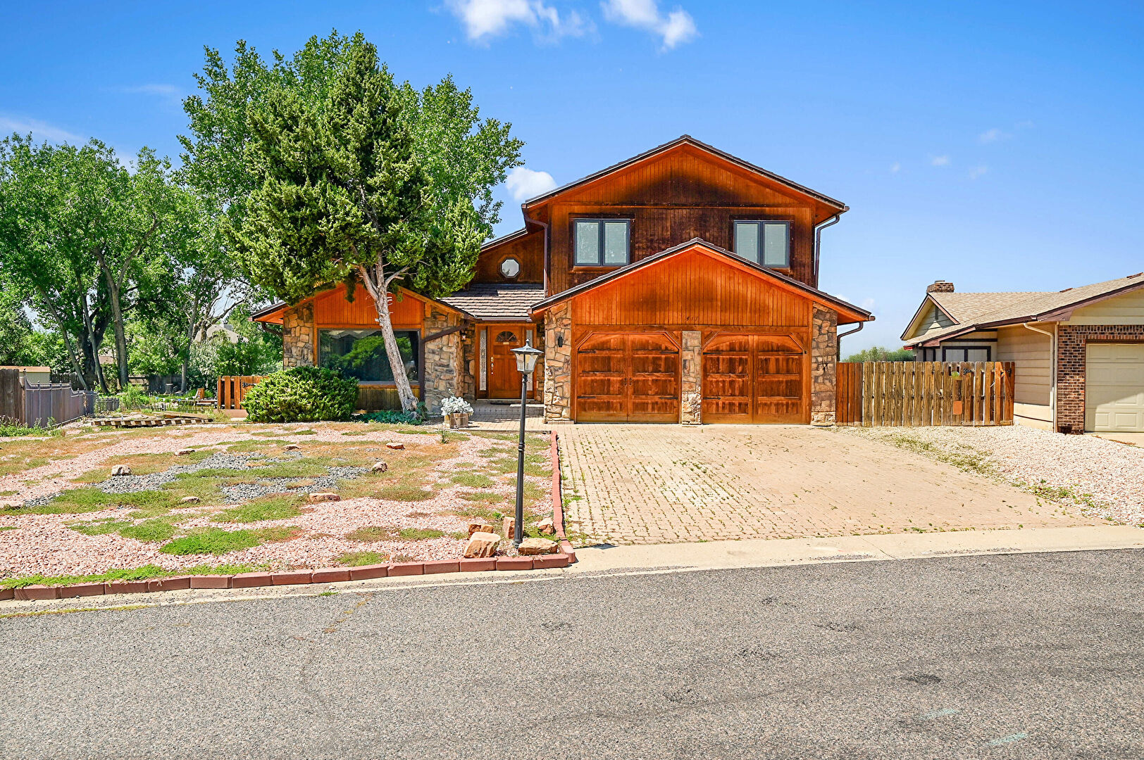 Front at 417 Orilla Del Lago, Fort Collins, CO 80524, listed by Moon Zhao