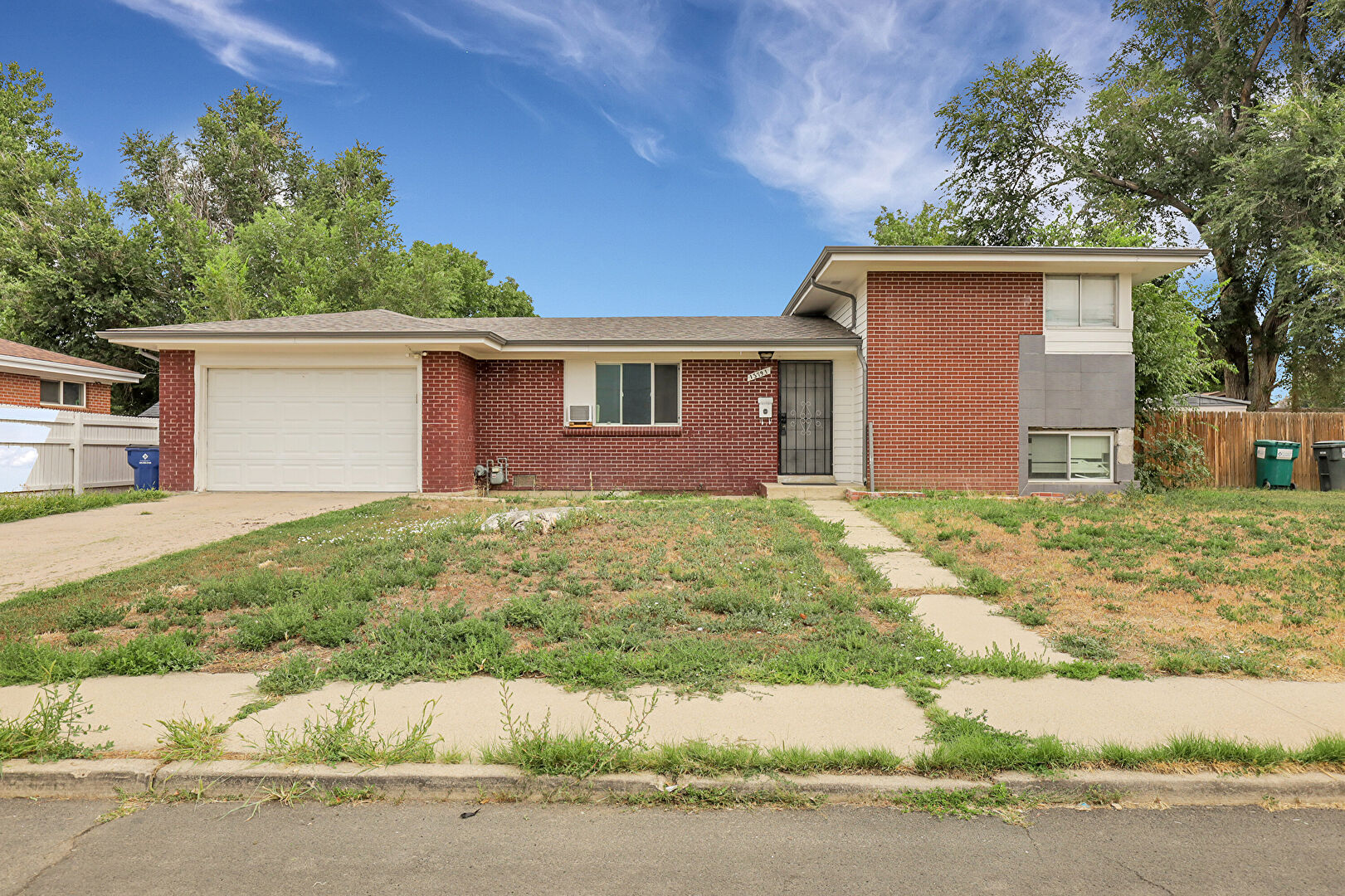 Front at 13791 East 23rd Avenue, Aurora, CO 80011, listed by Mariafe  McGregor