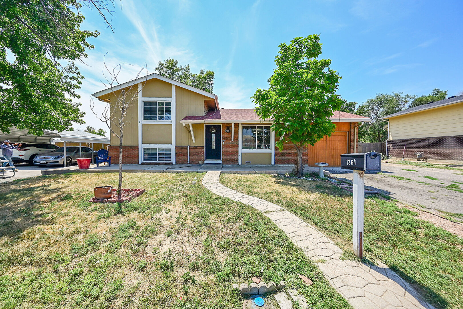 Front at 1364 Nueva Vista Drive, Denver, CO 80229, listed by Idalia Padilla, MLS ID: 4075897