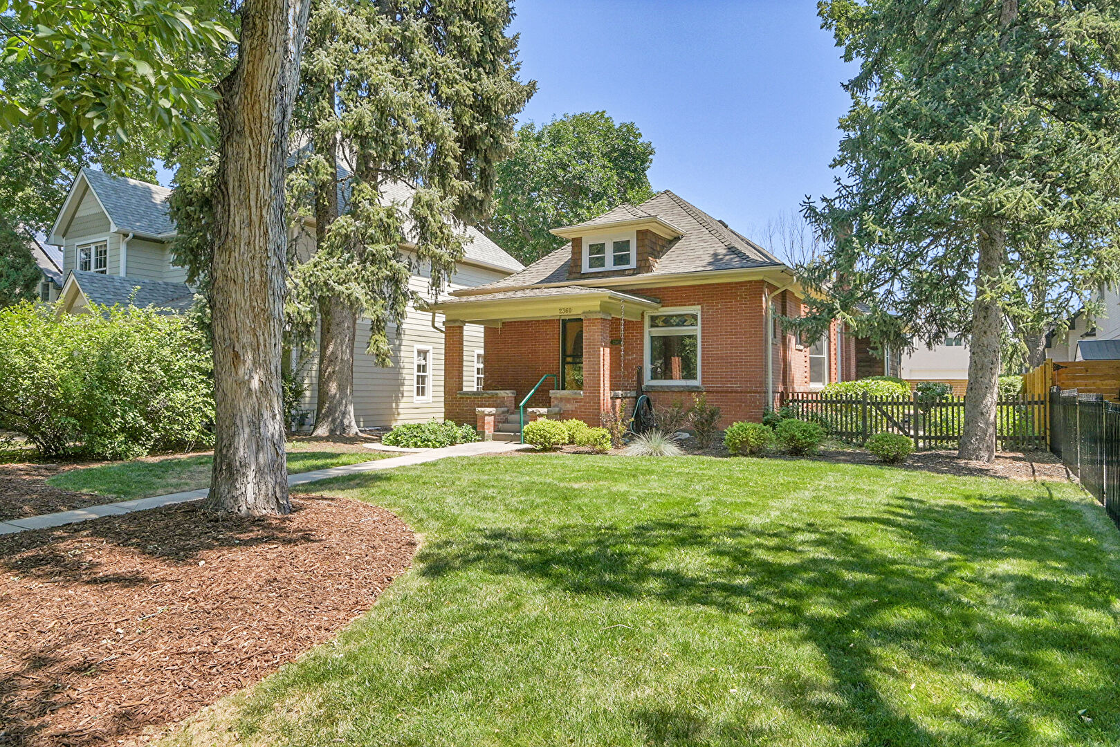 Front at 2360 South Milwaukee Street, Denver, CO 80210, listed by Jayson Holland