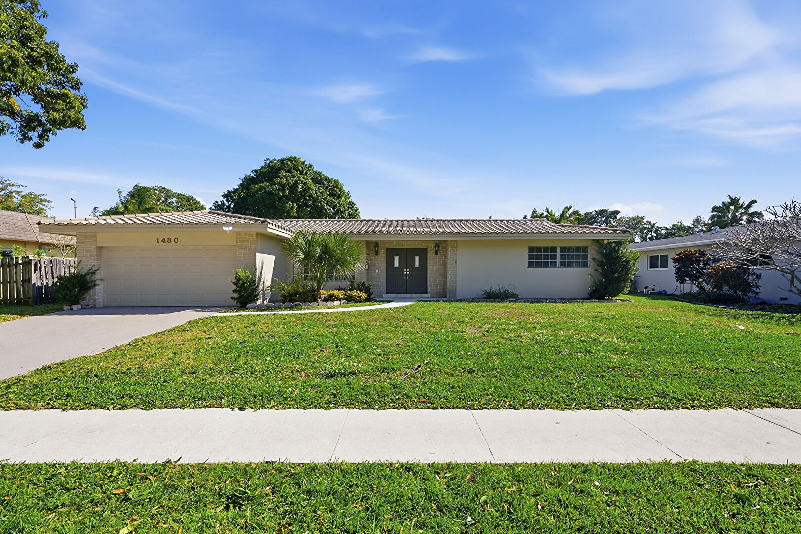 Front at 1430 Northwest 73rd Avenue, Plantation, FL 33313, listed by Sheryl Melson
