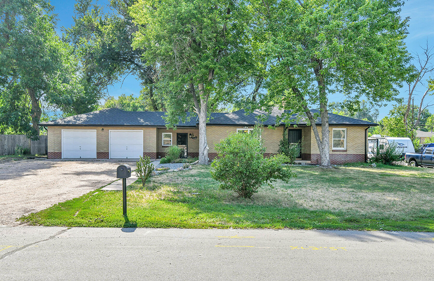 Front at 1249 Balsam Street, Lakewood, CO 80214, listed by Jayson Holland