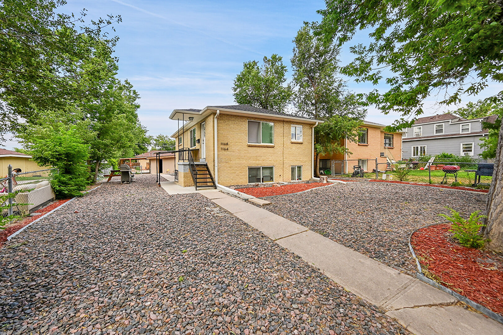 Front at 1164-1168 Dallas Street, Aurora, CO 80010, listed by Maria Mena