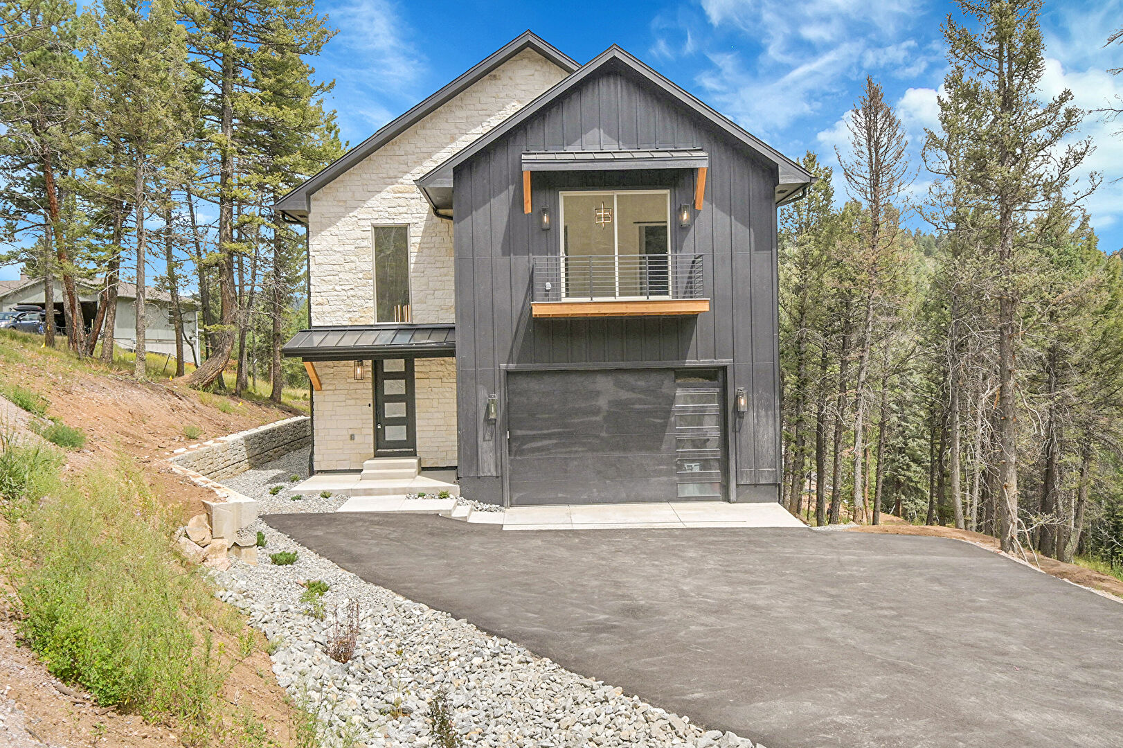Front at 28229 Juniper Drive, Conifer, CO 80433, listed by Katie Metzger