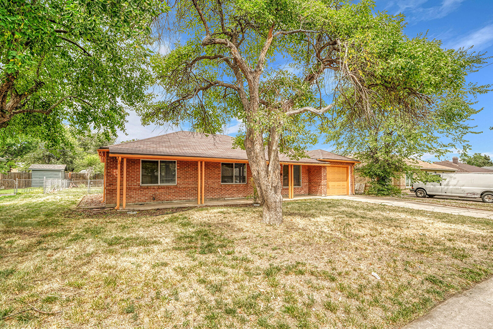 Front at 1245 Quari Street, Aurora, CO 80011, listed by Taylor Haas
