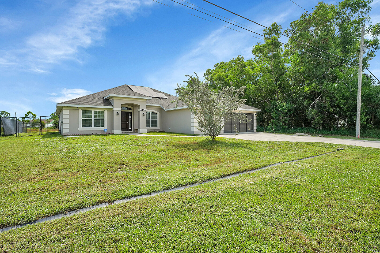 Front at 6904 Northwest Dorothy Street, Port St. Lucie, FL 34983, listed by Cameron Post, MLS ID: RX-11114143