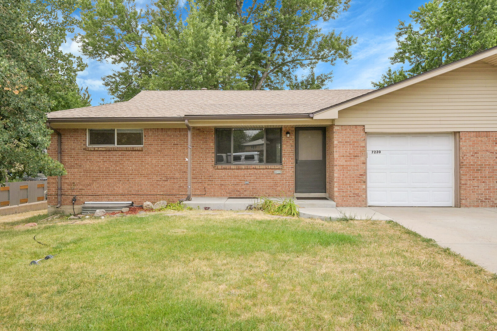 Front at 7220 West Arkansas Avenue, Lakewood, CO 80232, listed by Kristine Heller
