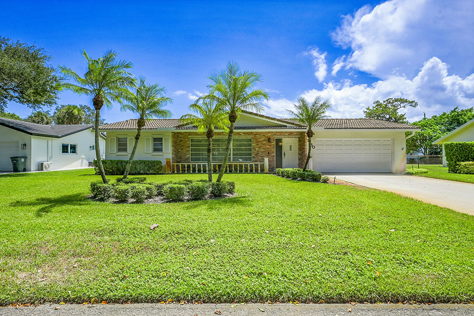 Front yard at 1180 SW 14th Drive, Boca Raton, FL 33486, listed by Donna  Hardy