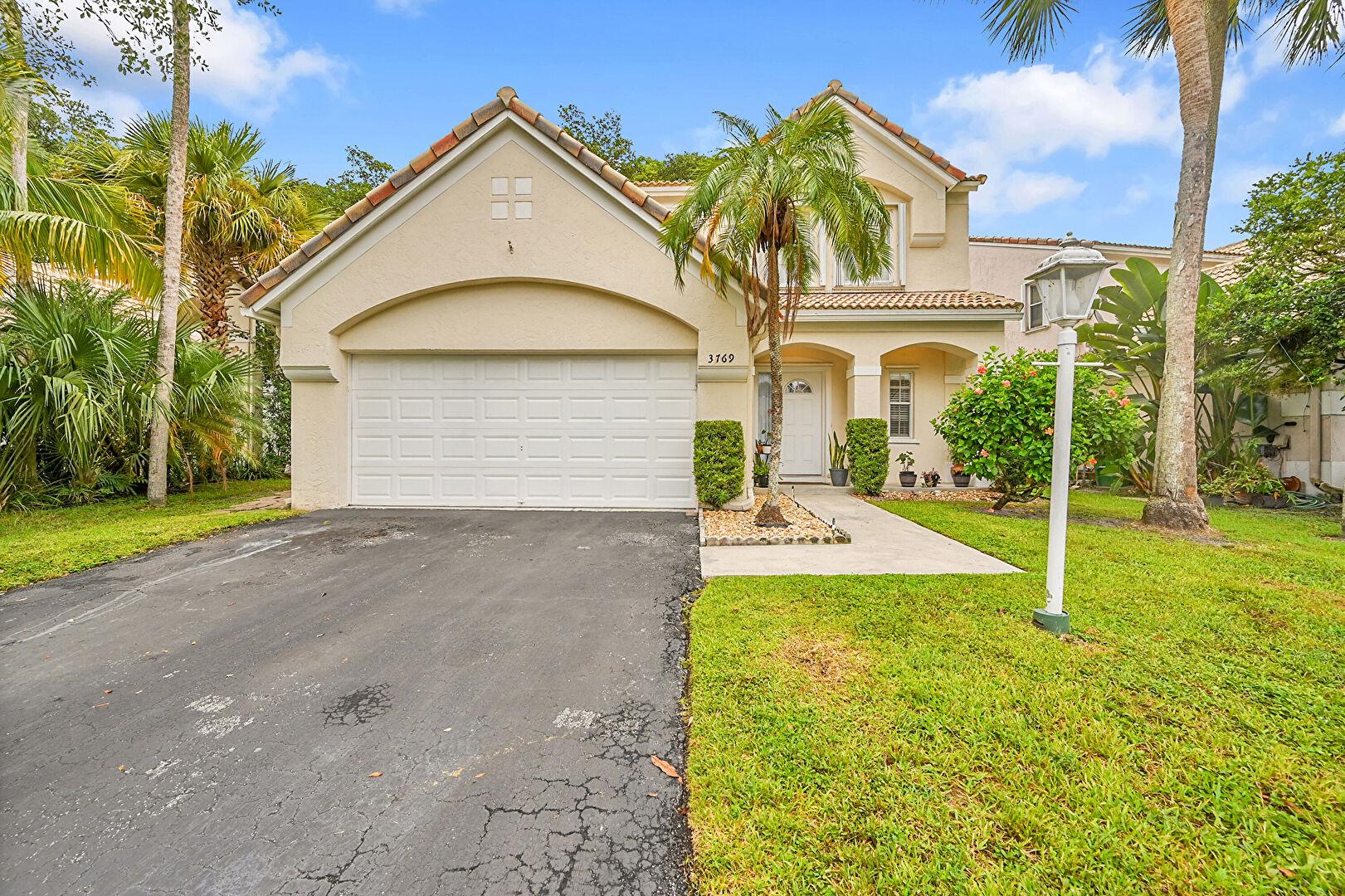 Front at 3769 Wilderness Way, Coral Springs, FL 33065, listed by Alejandra Mejia