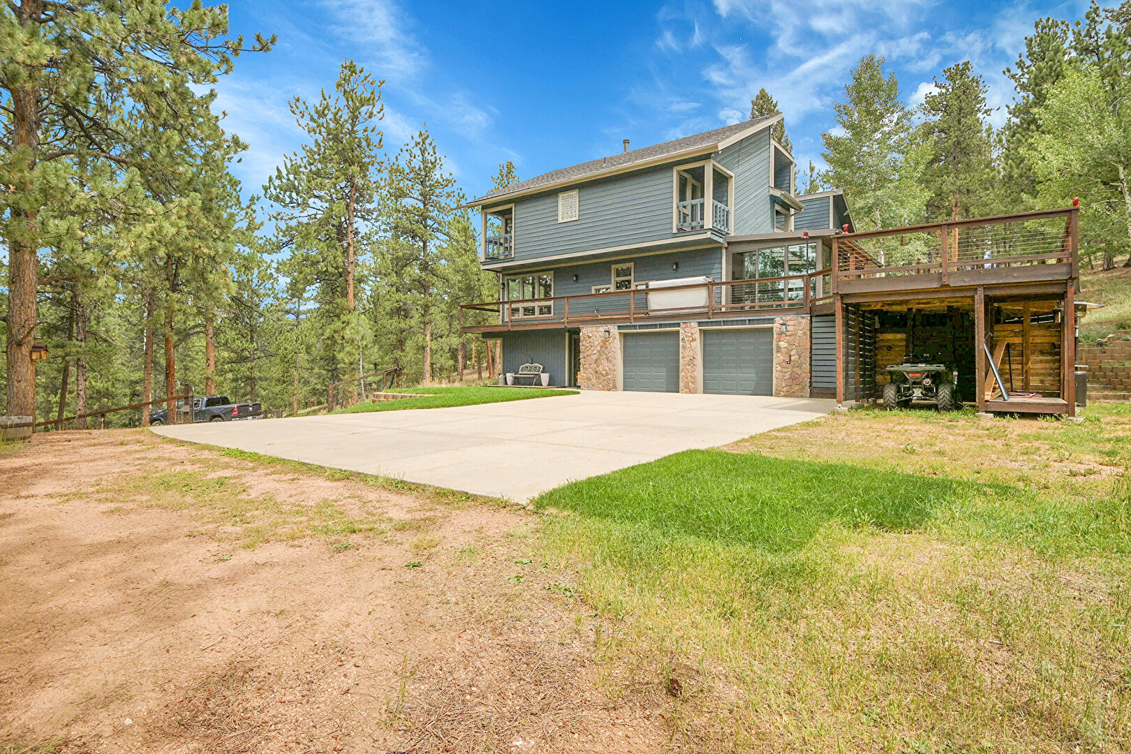 Property Exterior at 2302 Mount Evans Boulevard, Pine, CO 80470, listed by Sandra Bosworth