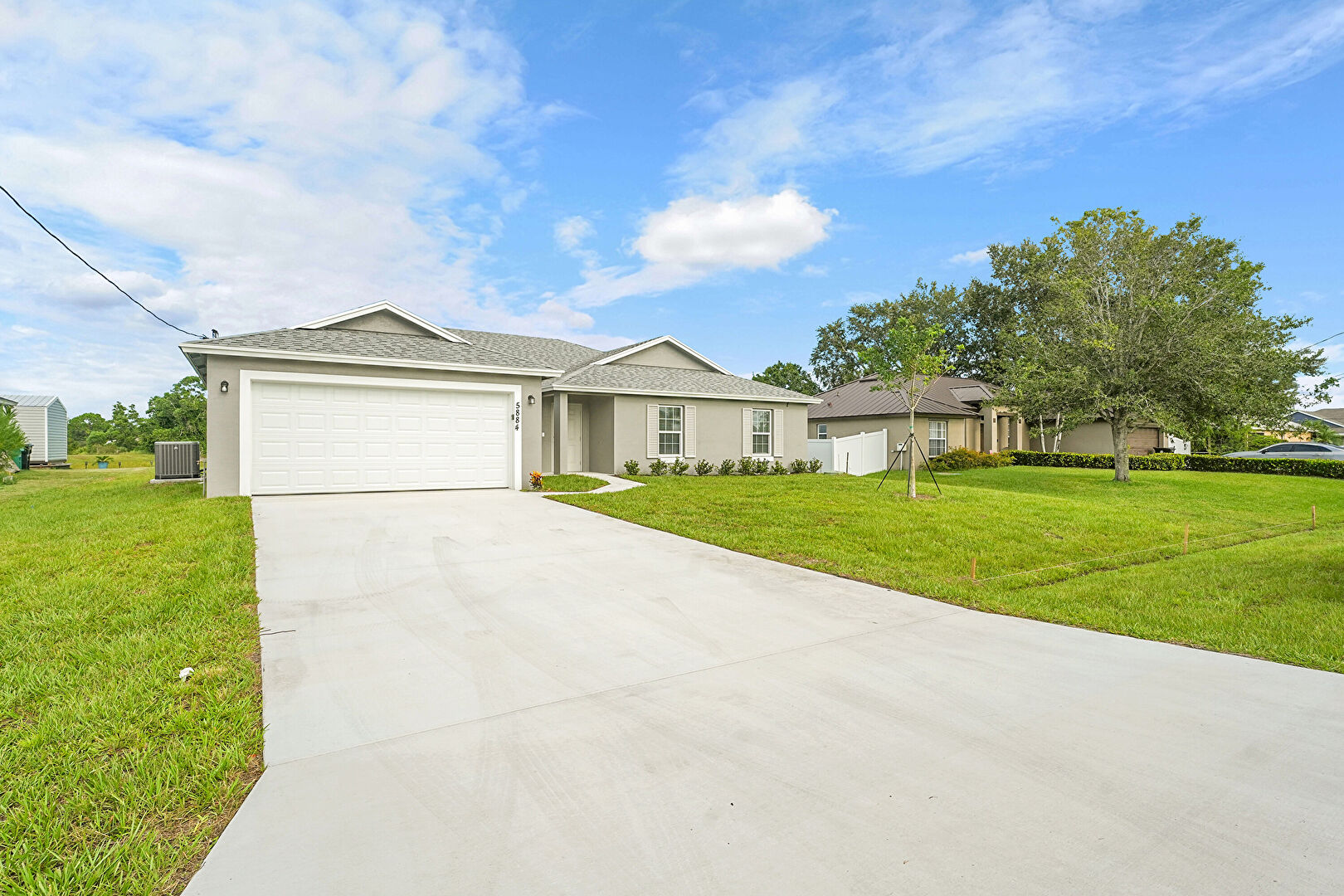 Front at 5884 Northwest Files Court, Port St. Lucie, FL 34986, listed by Jason M Coley