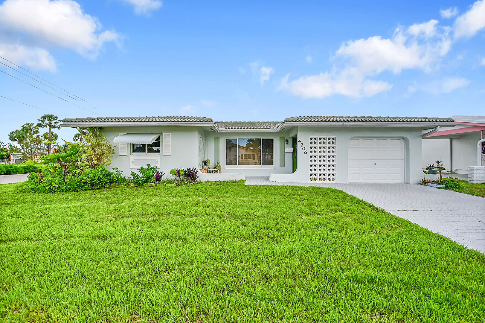 Front at 4706 Northwest 43rd Terrace, Tamarac, FL 33319, listed by Laura Sanders
