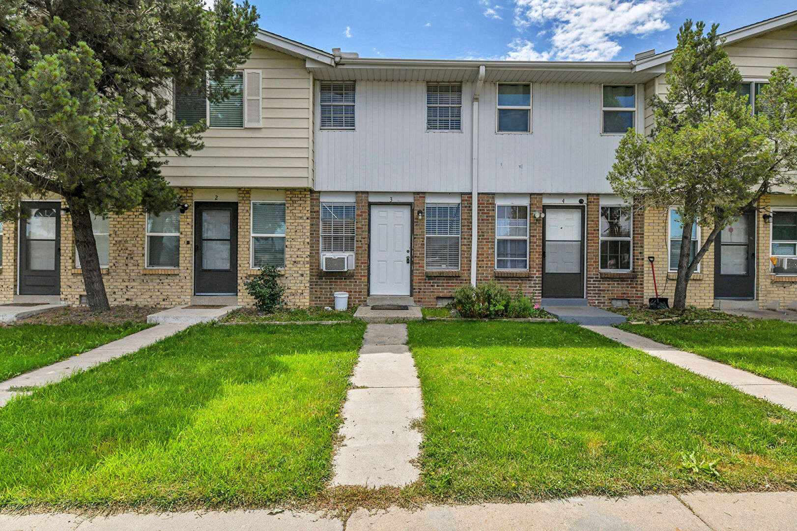 Front at 6550 West 14th Avenue, Denver, CO 80214, listed by Chad Swenson