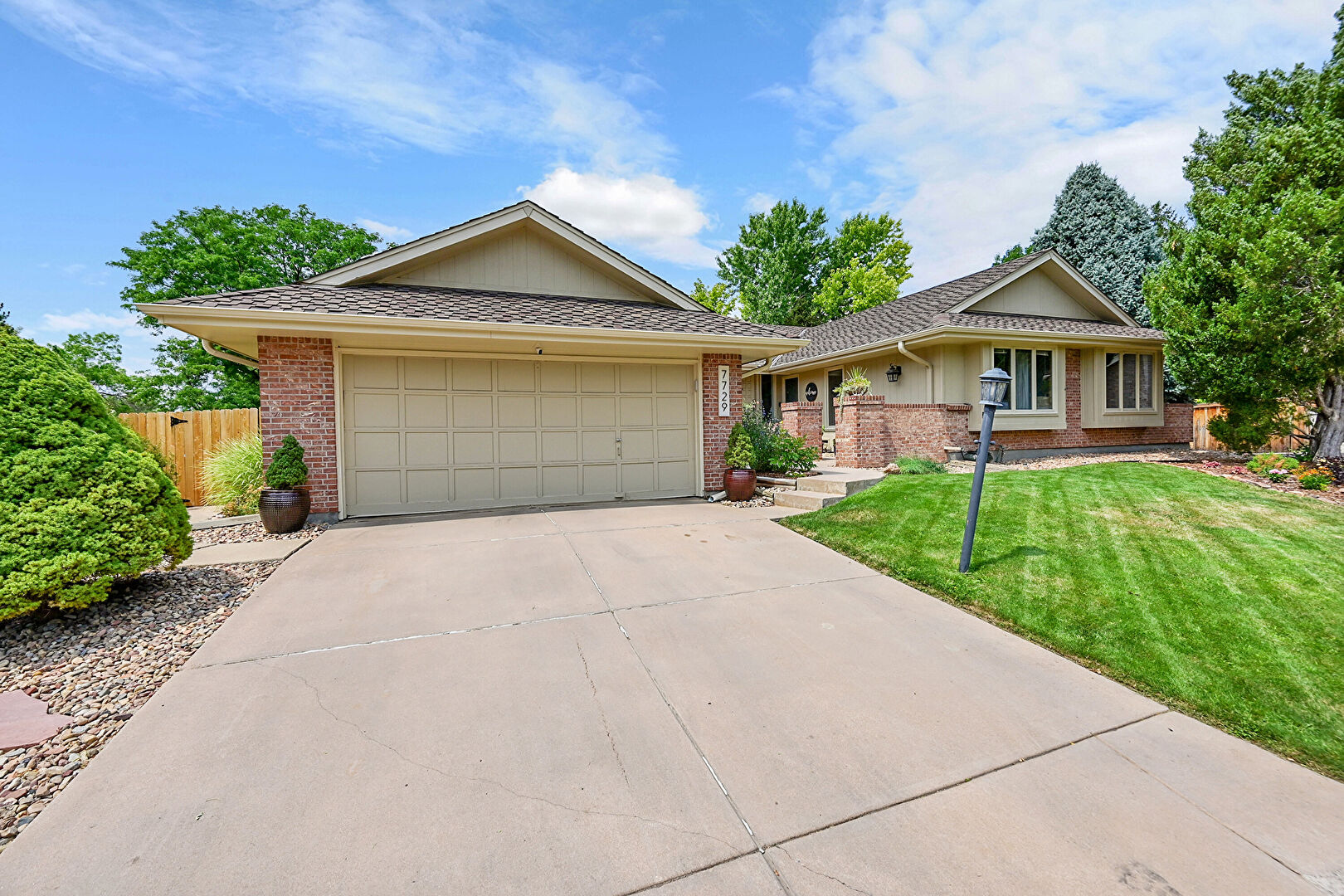 Front at 7729 South Dexter Court, Centennial, CO 80122, listed by Rima Garkow