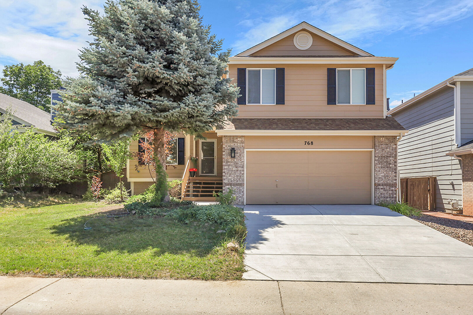 Front at 768 Poppywood Place, Littleton, CO 80126, listed by Julie Bonicelli-Oliva