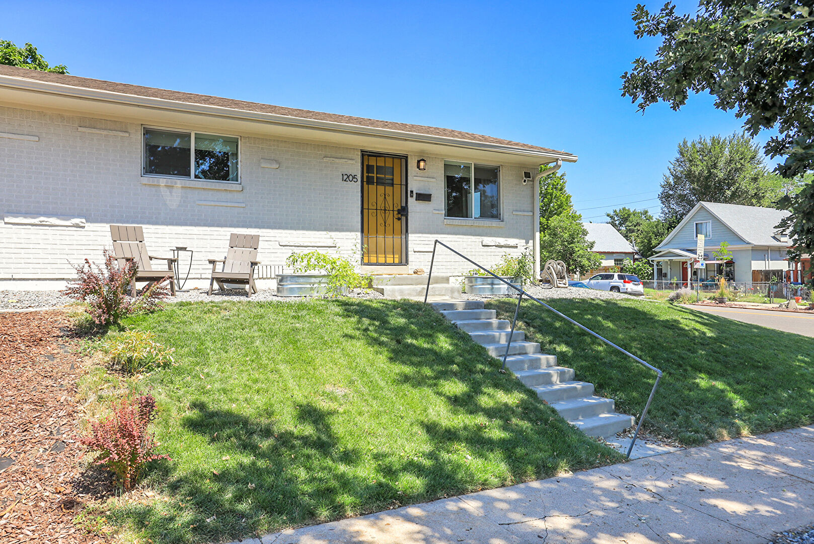 Front at 1205 W 39th Ave, Denver, CO 80211, listed by Will Story
