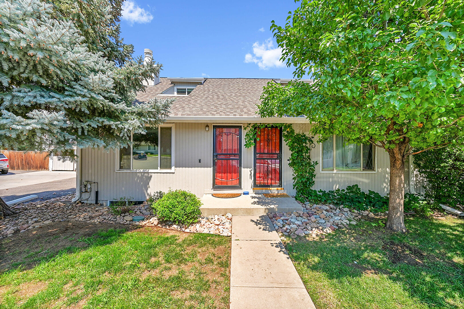Front at 1248 South Reed Street, unit 1, Lakewood, CO 80232, listed by Mike & Ed Hardey