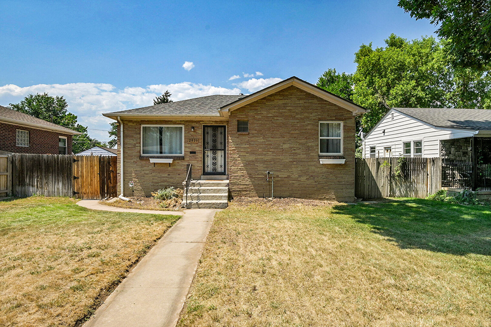 Front at 2975 South Logan Street, Englewood, CO 80113, listed by Colleen Simpson