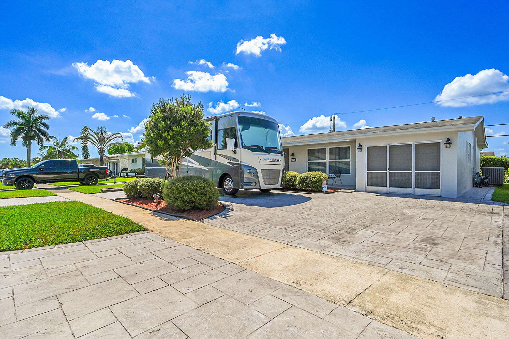 Front at 9060 Northwest 25th Street, Sunrise, FL 33322, listed by Laura Sanders