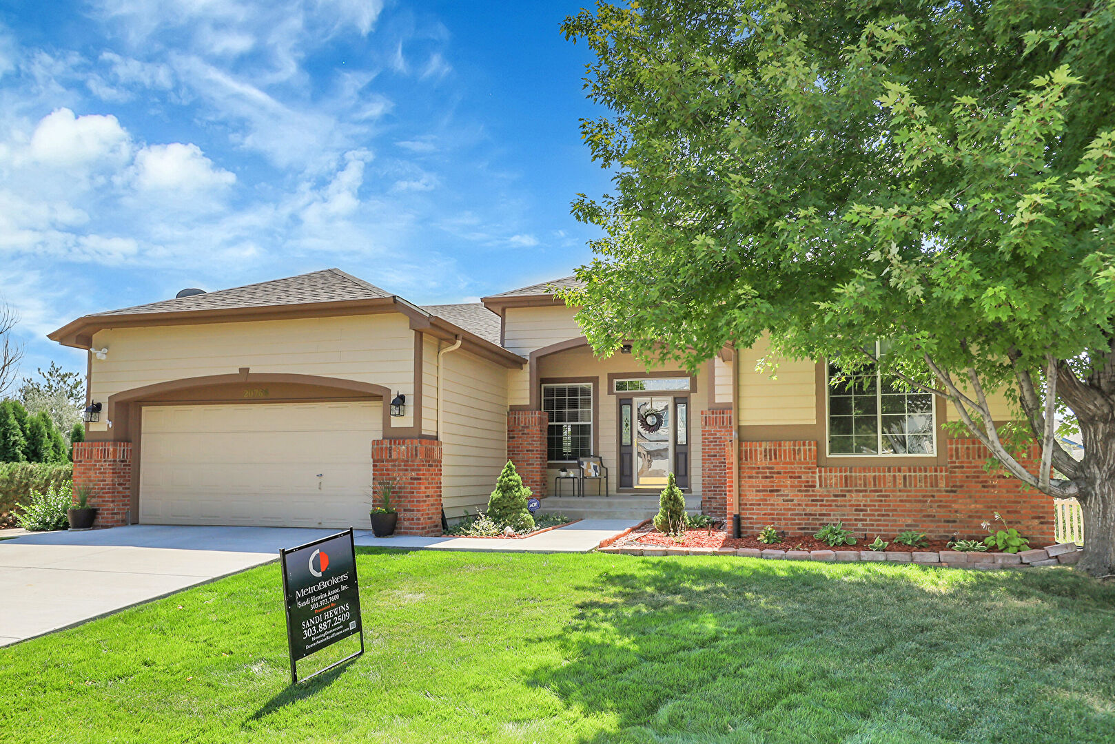 Front at 20768 East Fair Lane, Centennial, CO 80016, listed by Sandi Hewins