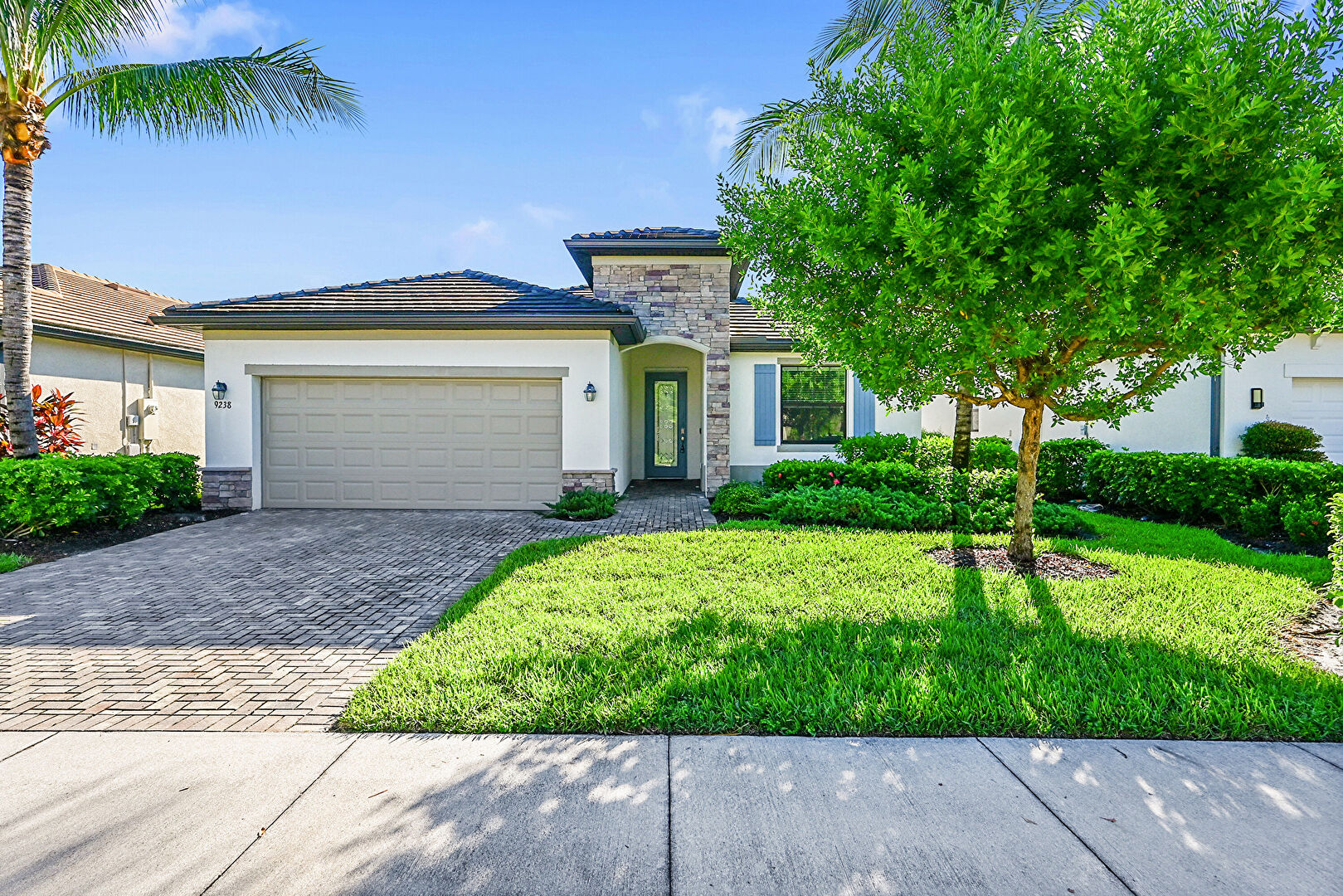 Front at 9238 Shadow Oak Lane, Naples, FL 34120, listed by Robert Meyer