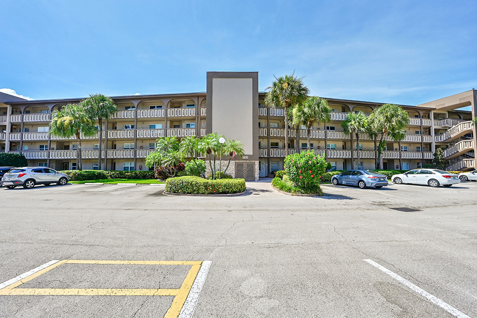Front at 1701 Andros Isle unit G4, Coconut Creek, FL 33066, listed by Laura Sanders