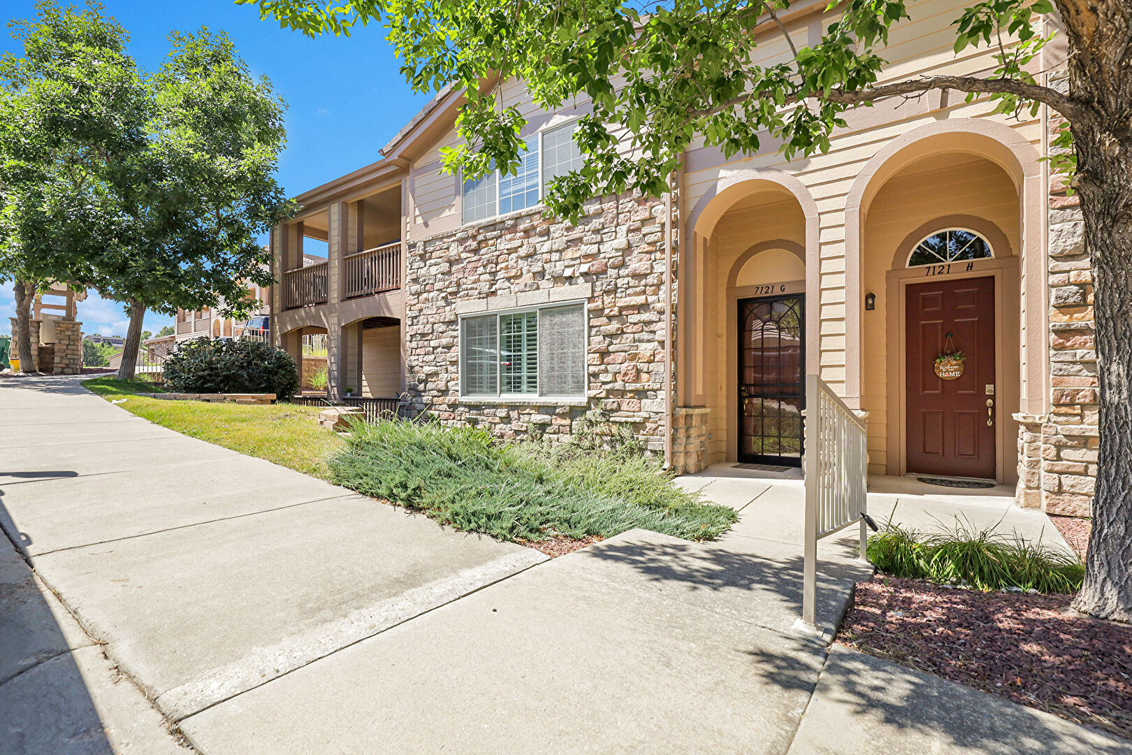 Exterior Entry at 7121 S Wenatchee Way G, Aurora, CO 80016, listed by Jo Klimecki