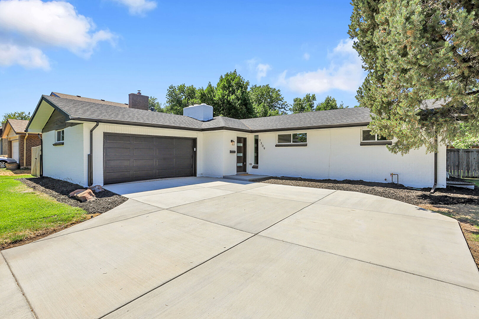 Front at 3309 South Galena Court, Denver, CO 80231, listed by Jeff Manley