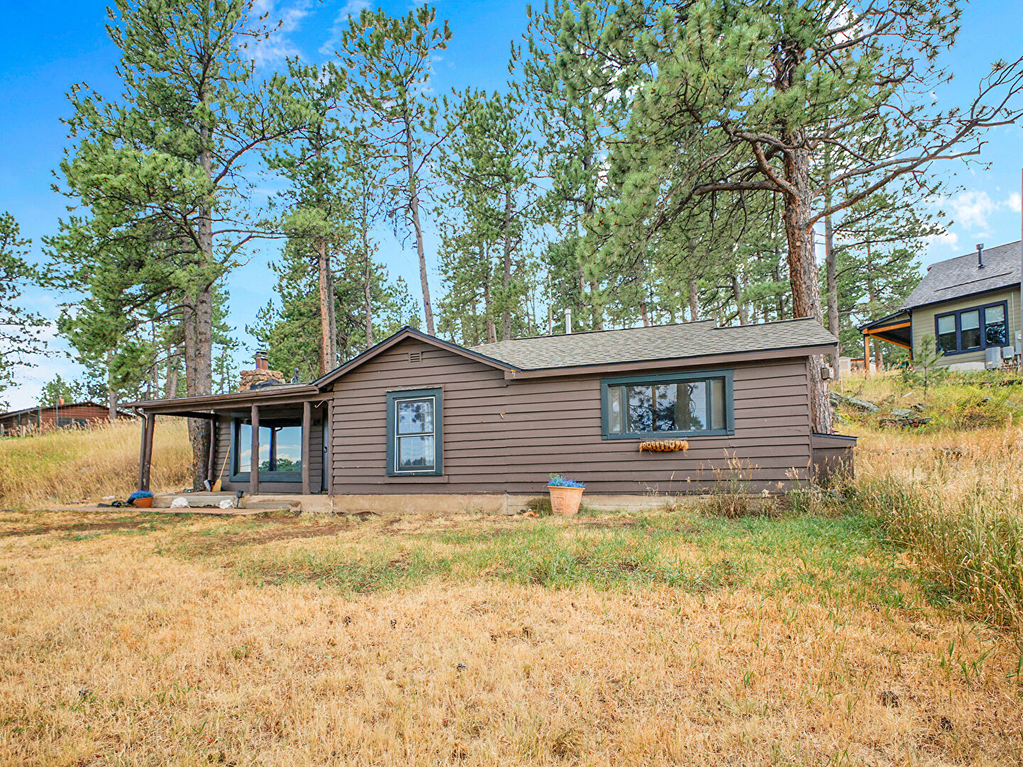 Front at 3851 S Palo Verde Road, Evergreen, CO 80439, listed by Katie Metzger