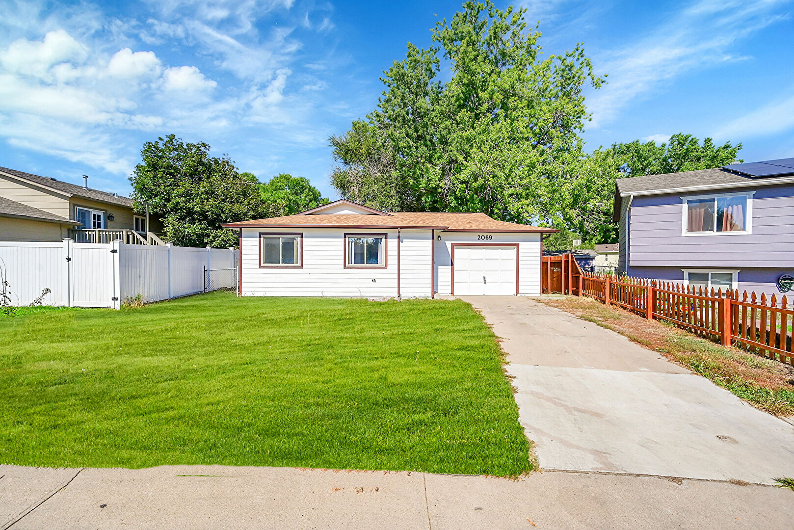 Front at 2069 Wedgewood Court, Greeley, CO 80631, listed by Brad Inhulsen