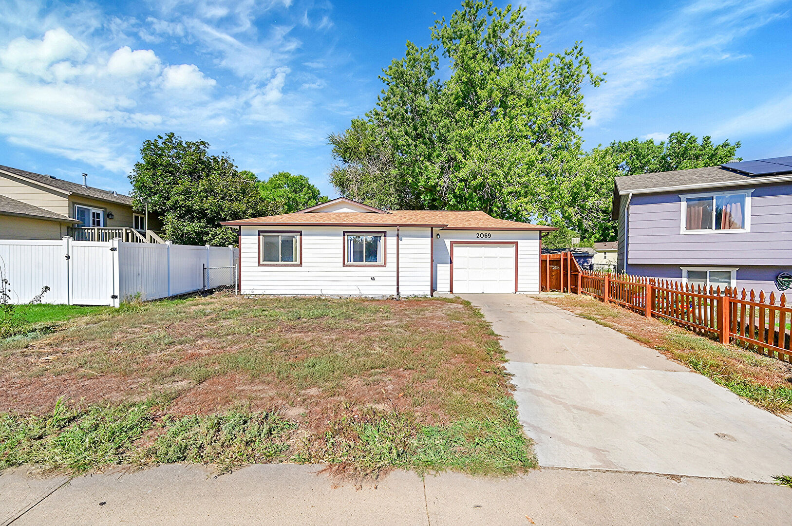Front at 2069 Wedgewood Court, Greeley, CO 80631, listed by Brad Inhulsen