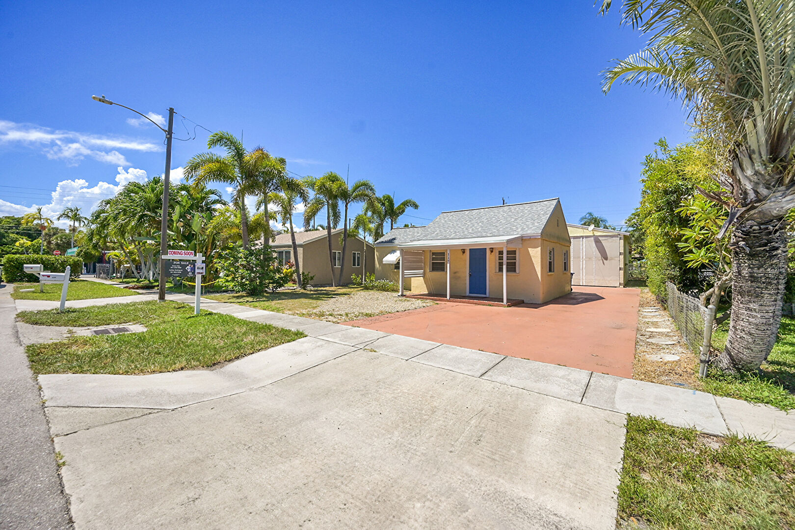 Front yard at 117 Mayfield Road, Lantana, FL 33462, listed by Dawn Ritz