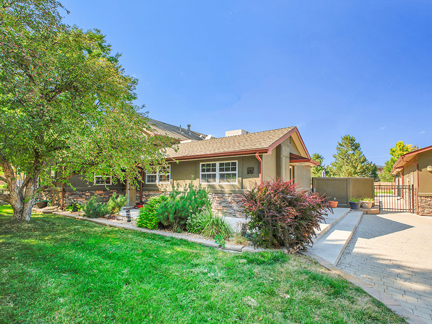 Front at 16395 West 54th Avenue, Golden, CO 80403, listed by Zach McGuire