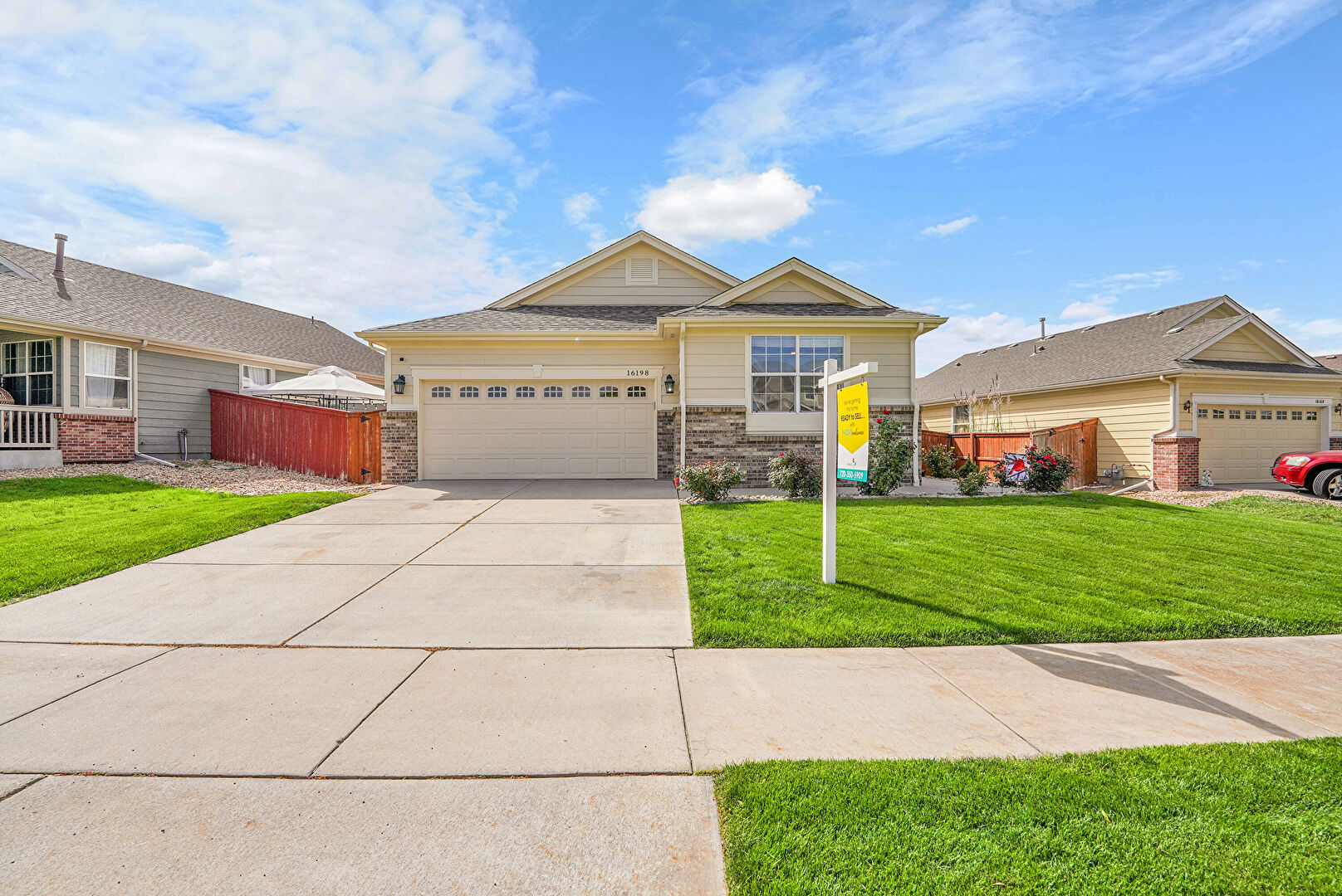 Front at 16198 East 105th Way, Commerce City, CO 80022, listed by Tatyana Sturm