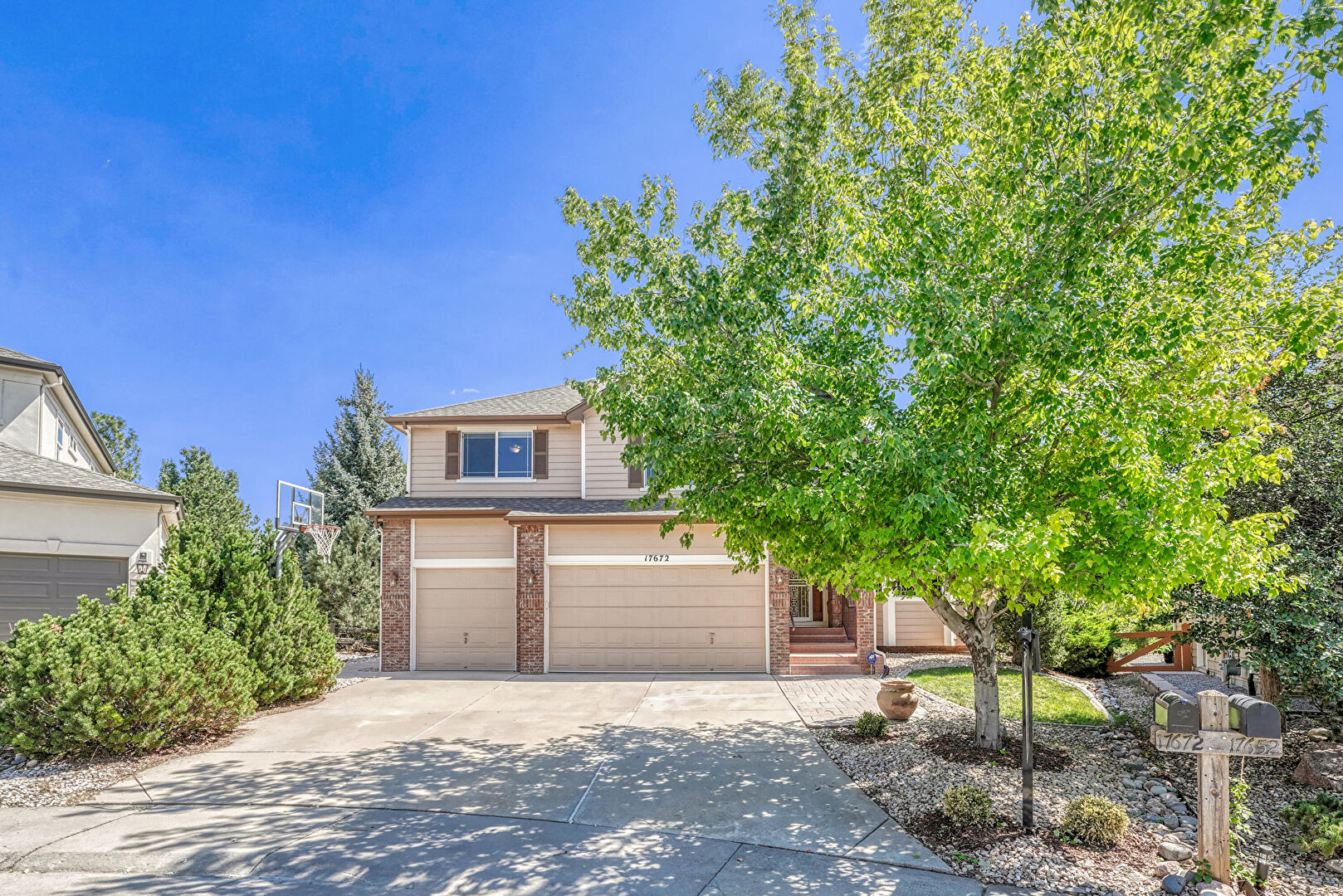 Front at 17672 East Weaver Place, Aurora, CO 80016, listed by Mike & Ed Hardey