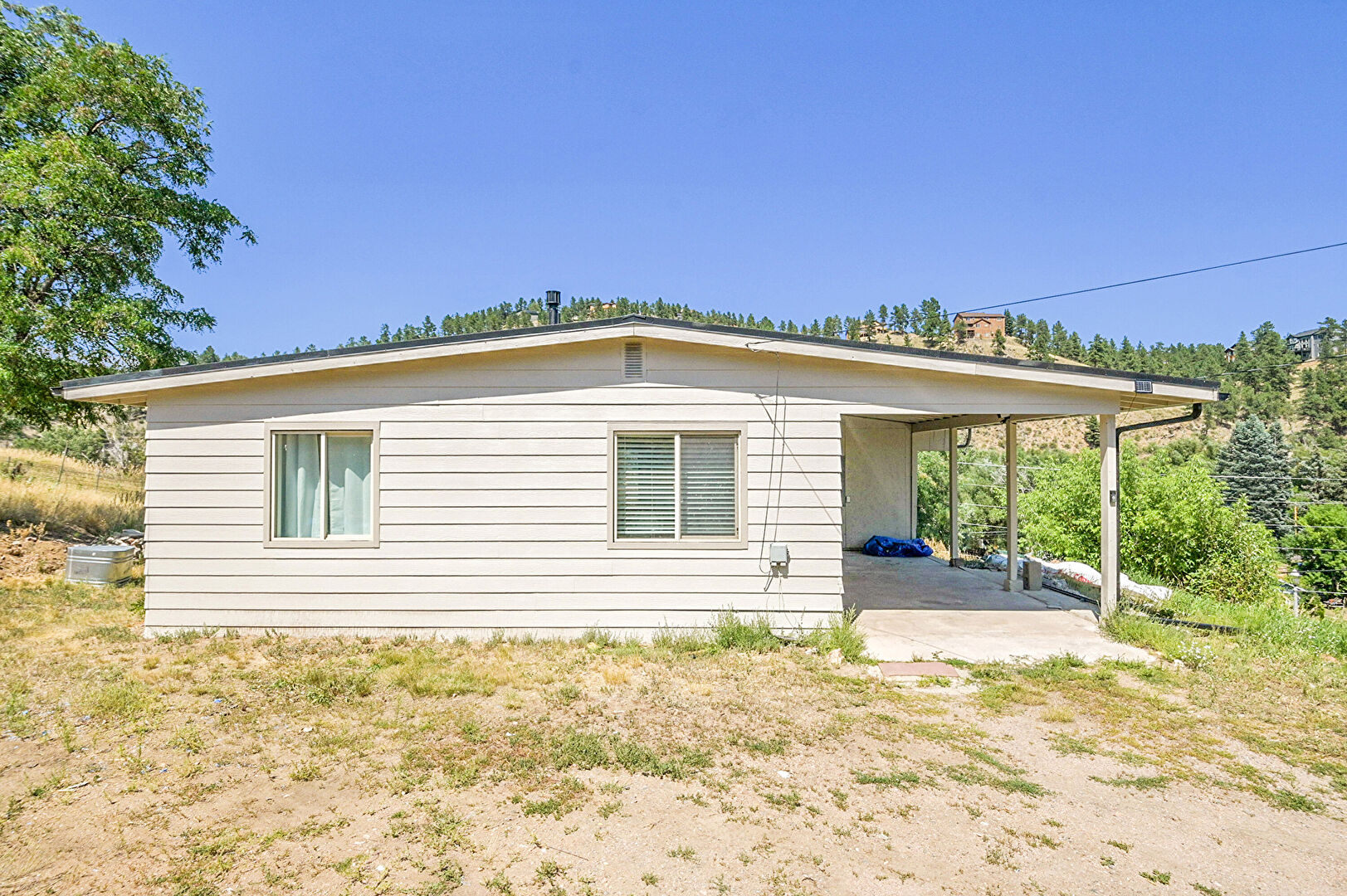 Property Exterior at 26223 Seitz Road, Evergreen, CO 80439, listed by Sandra Bosworth