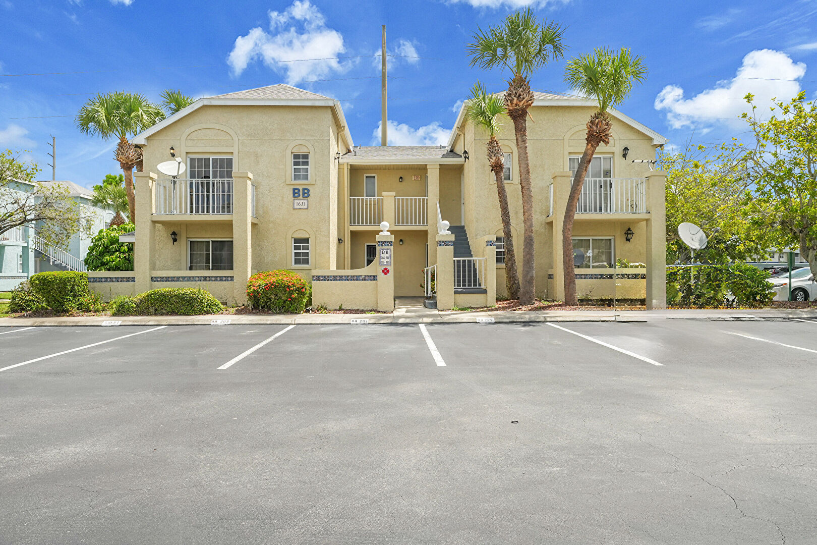 Front at 1631 Southeast Green Acres Circle, Unit BB203, Port St. Lucie, FL 34952, listed by Margaret Good