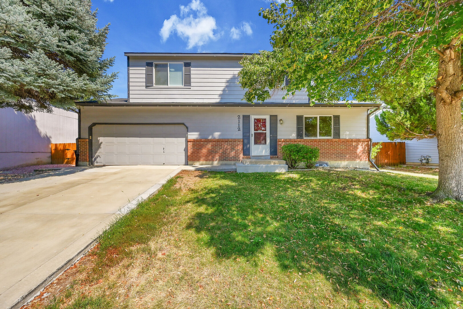 Front at 2112 Spencer Street, Longmont, CO 80501, listed by Debra Graves