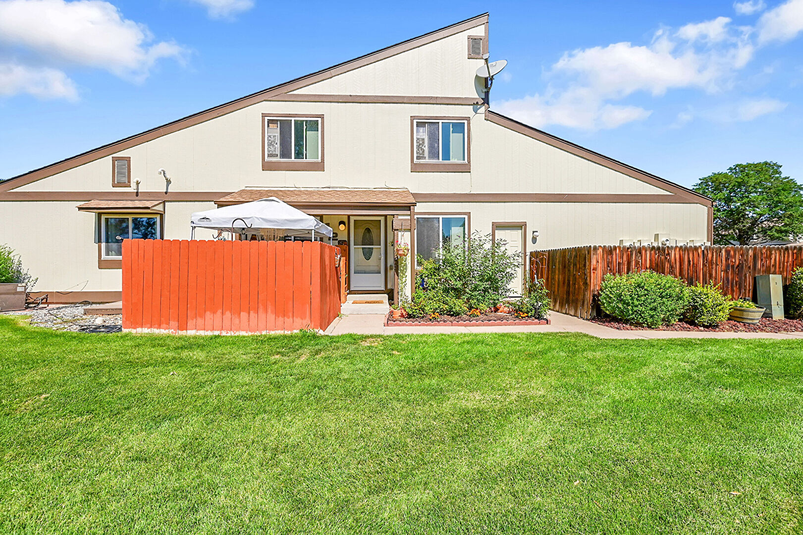 Front at 8742 Pierce Way, 129, Arvada, CO 80003, listed by Shelby Fifer